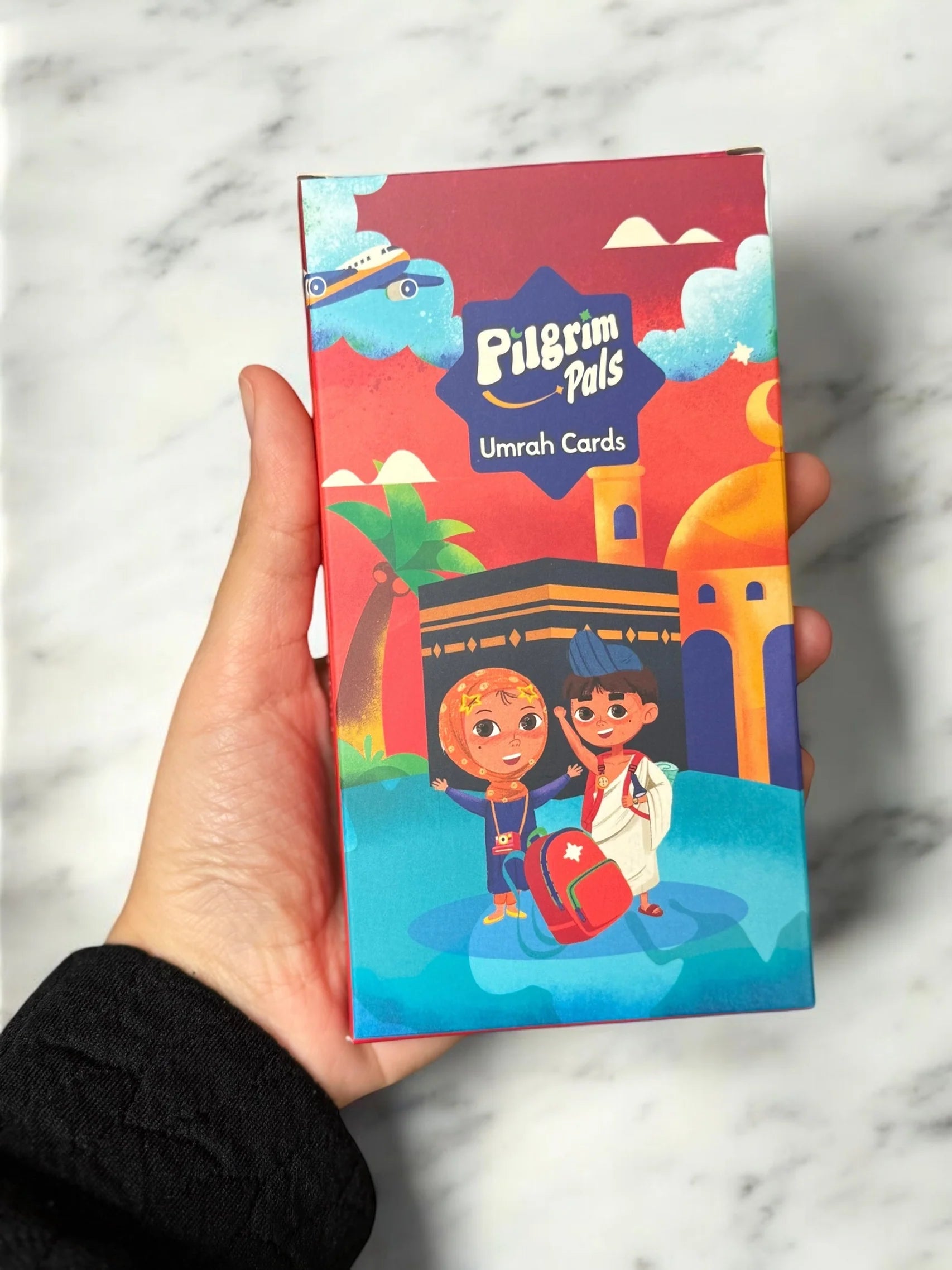 muslim_holding_pilgrim_pals_umrah+flash_cards